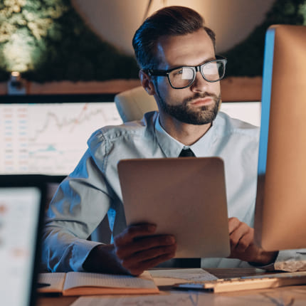 A man following ERP software development company best practice: analyzing